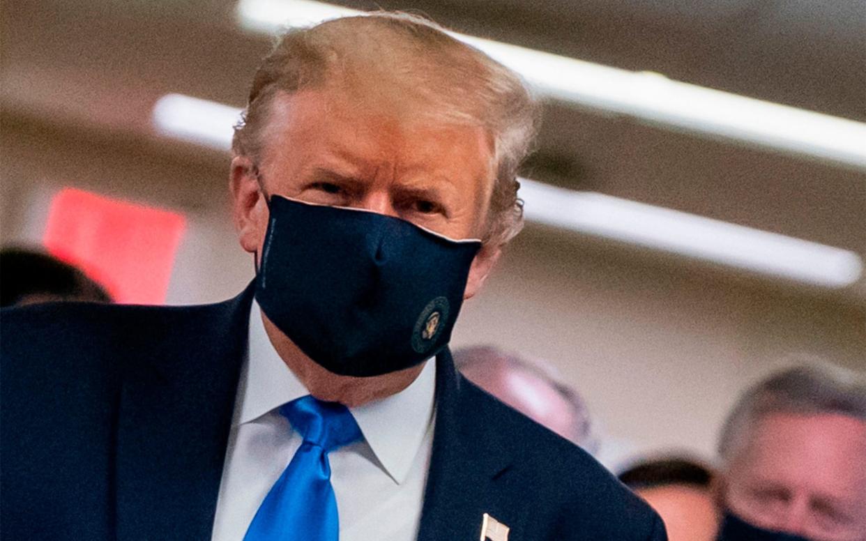 Donald Trump wears Covid-19 mask - Alex Edelman/AFP