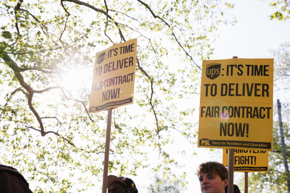 UPS workers and Teamsters members during a rally outside a UPS hub in the Brooklyn borough of New York, US, on Friday, April 21, 2023.<span class="copyright">Paul Frangipane—Bloomberg/Getty Images</span>