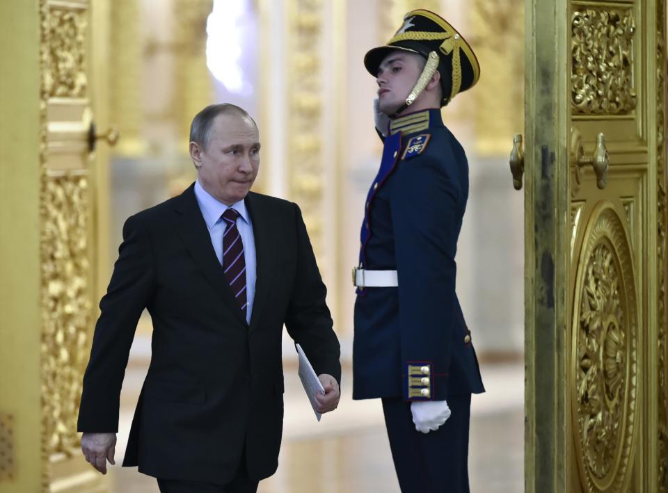 Russian President Vladimir Putin arrives to chair a meeting of the Pobeda (Victory) Organizing Committee in the Kremlin