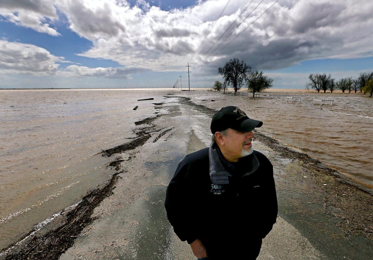 Tulare Lake is reemerging as flood water spreads across miles of California farmland. <a href="https://www.gettyimages.com/detail/news-photo/agribusiness-consultant-mark-grewel-stands-on-a-farm-road-news-photo/1249529651" rel="nofollow noopener" target="_blank" data-ylk="slk:Luis Sinco / Los Angeles Times via Getty Images;elm:context_link;itc:0;sec:content-canvas" class="link ">Luis Sinco / Los Angeles Times via Getty Images</a>