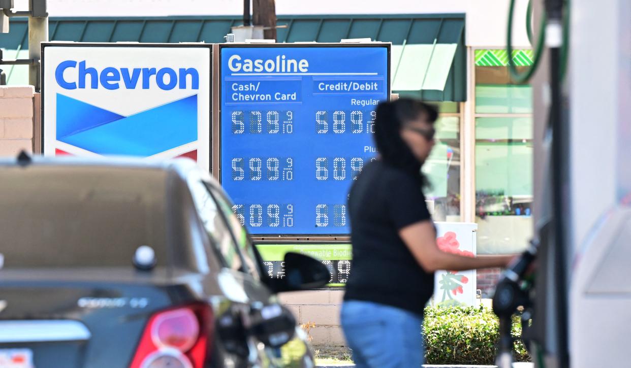 Gas prices are displayed at a petrol station in Monterey Park, California, on July 19, 2022. - US gasoline prices have fallen from historic highs earlier in the summer, a retreat highlighted by a politically beset White House as a sign of moderating inflation. President Joe Biden took to Twitter to point out that prices at the pump have fallen for more than a month, saving the average driver about $25 a month. Gasoline prices are now at a national average of $4.495 per gallon, down 10 percent from a month ago but up 42 percent from the year-ago level, according to the American Automobile Association. (Photo by Frederic J. BROWN / AFP) (Photo by FREDERIC J. BROWN/AFP via Getty Images)