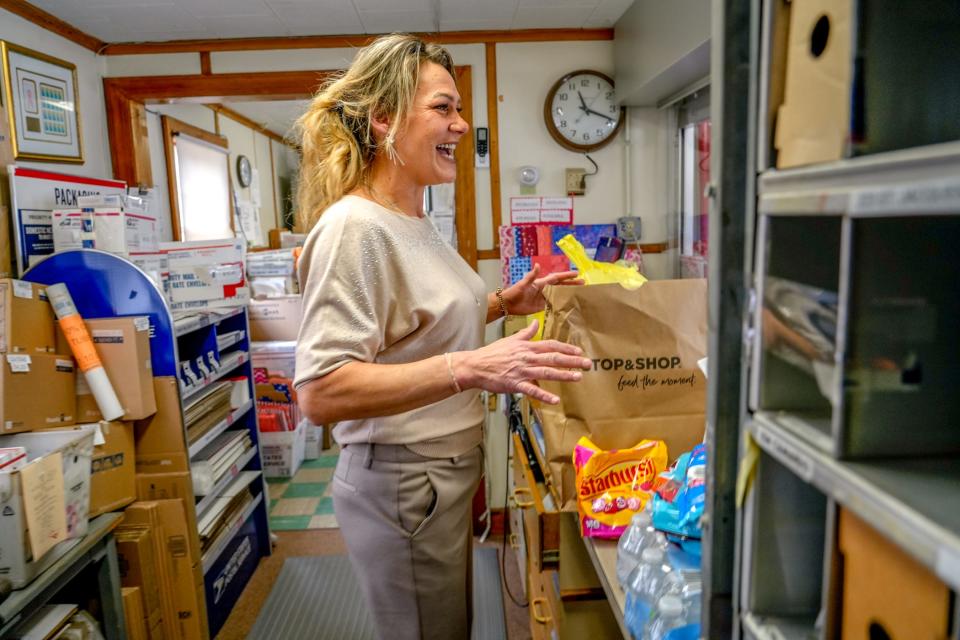 The Fiskeville Post Office celebrates "Date Meets ZIP" day on Feb. 8, which matches its ZIP code, 02823. "A lot of people have been here their entire lives," said Postmaster Kristen Schwartz, seen here. "They probably don’t know what it’s like to get mail delivery."
