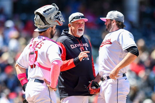 Pitching coach Carl Willis , center, is an underappreciated member of the Guardians' brain trust.