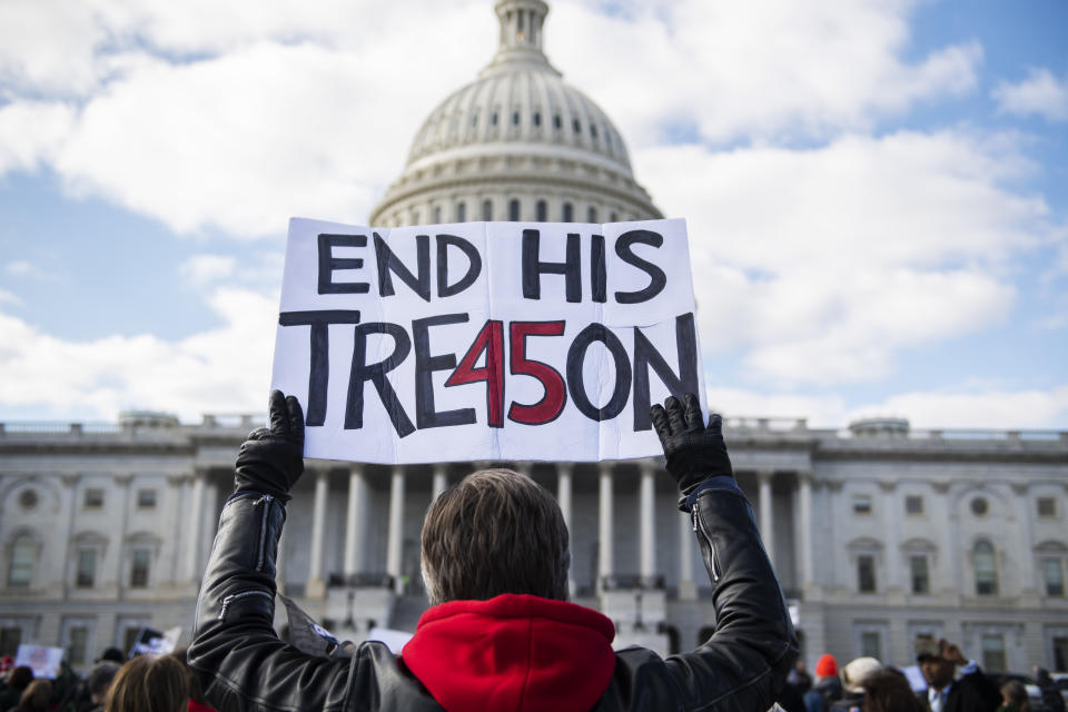 Demonstrators calling for witnesses in the impeachment trial of President Donald Trump, assemble on the East Front of the Capitol on Wednesday, January 29, 2020. (Tom Williams/CQ Roll Call via Getty Images)