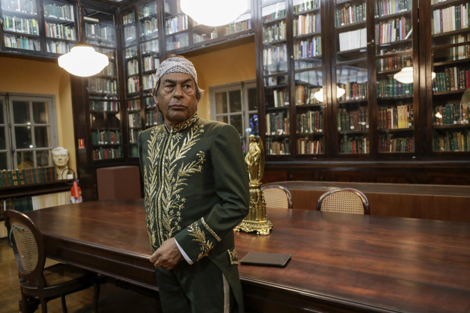 Indigenous writer and environmental activist Ailton Krenak stands at the Brazilian Academy of Letters during his admission ceremony in Rio de Janeiro, Brazil, Friday, April 5, 2024. Krenak is the first Indigenous person to be elected to the academy. (AP Photo/Bruna Prado)