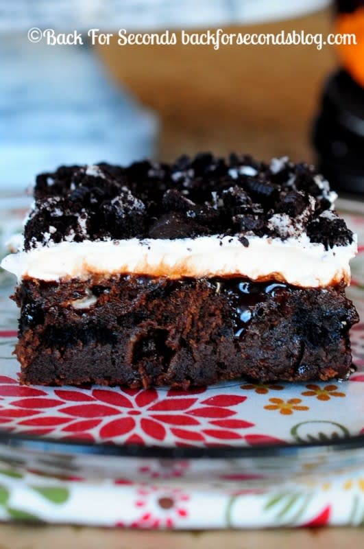 <p>Back for Seconds</p><p>I am calling this a cake but it is SO fudgy it’s almost more like a brownie. It’s ooey gooey and absolutely divine!</p><p><strong>Get the recipe: </strong><strong><a href="http://backforseconds.com/marshmallow-oreo-fudge-cake/" rel="nofollow noopener" target="_blank" data-ylk="slk:Marshmallow Oreo Fudge Cake;elm:context_link;itc:0;sec:content-canvas" class="link rapid-noclick-resp">Marshmallow Oreo Fudge Cake</a></strong></p>