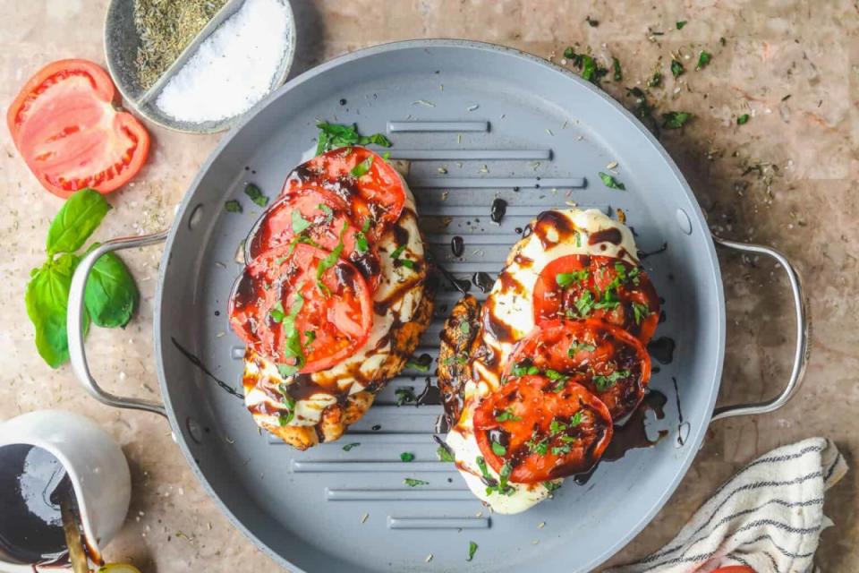 <p>Britney Breaks Bread</p><p>Caprese Grilled Chicken with Herb Roasted Potatoes is a healthy chicken recipe with tons of flavor. It's quick, delicious, and easy to make!</p><p><strong>Get the recipe: <a href="https://britneybreaksbread.com/caprese-grilled-chicken-with-herb-roasted-potatoes/" rel="nofollow noopener" target="_blank" data-ylk="slk:Caprese Grilled Chicken with Herb Roasted Potatoes;elm:context_link;itc:0;sec:content-canvas" class="link ">Caprese Grilled Chicken with Herb Roasted Potatoes</a></strong></p>