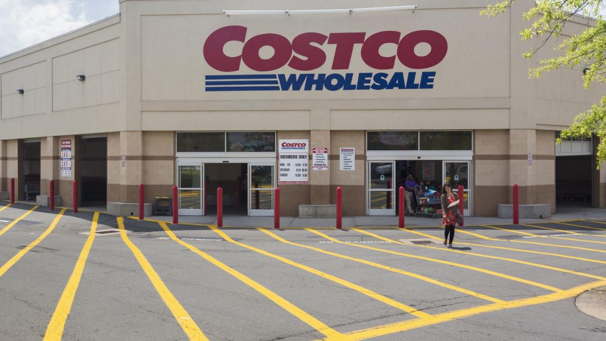 entrance to large costco warehouse superstore in manassas, virginia, usa