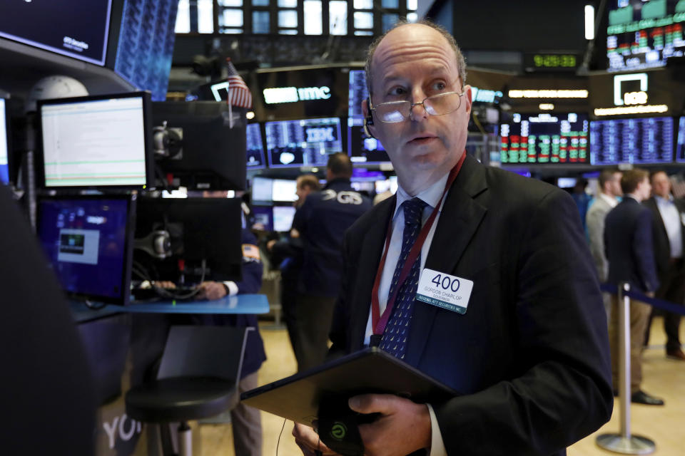 Trader Gordon Charlop works on the floor of the New York Stock Exchange, Tuesday, June 11, 2019. Stocks are rising early Tuesday as Wall Street continues to thrive in June. (AP Photo/Richard Drew)