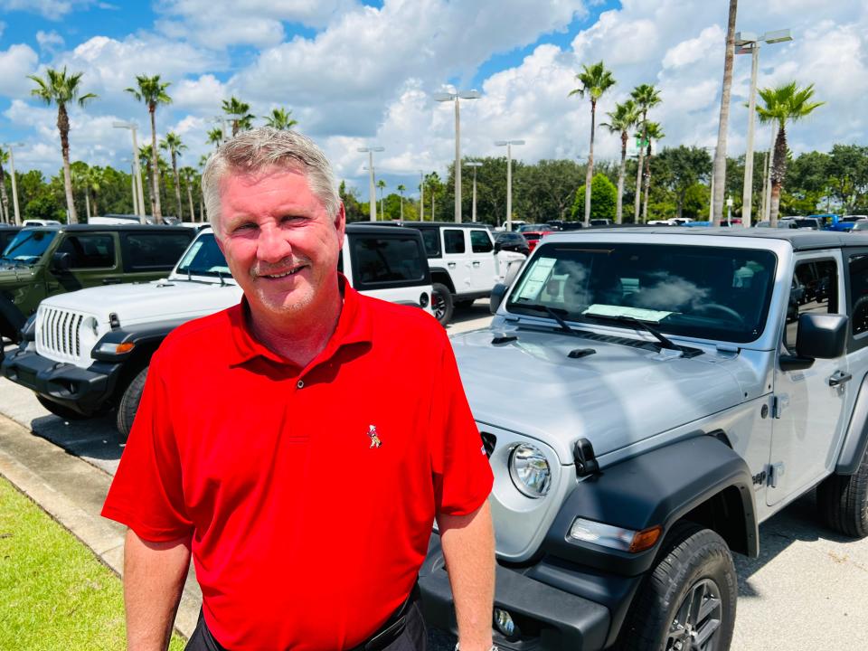 Randy Dye, owner of Daytona Dodge Chrysler Jeep Ram at the Daytona International Auto Mall, stands next to a row of Jeep Wranglers on Friday, Sept. 15, 2023. He said he has new Jeep Wranglers and Jeep Gladiators in stock for now, but would be concerned if the UAW strike that began Friday at the Stellantis plant in Ohio that makes them goes for an extended period of time.