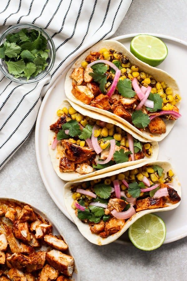 bbq chicken tacos with corn and pickled onions