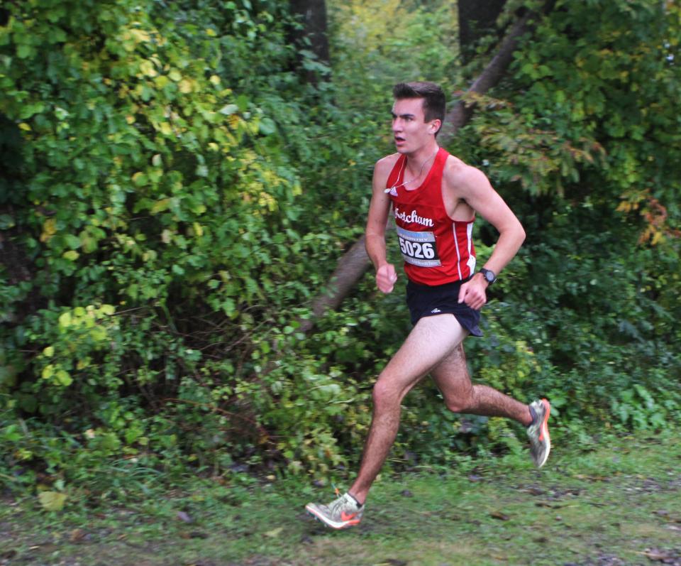 Connor Hitt of Ketcham runs up a small incline while leading the pack en route to his win during the Dan Purdy Memorial Cross-Country Invitational Sept. 20, 2023 at Pawling High.