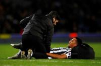 Soccer Football - FA Cup Third Round Replay - Blackburn Rovers v Newcastle United - Ewood Park, Blackburn, Britain - January 15, 2019 Newcastle United's Isaac Hayden receives treatment from the physio after sustaining an injury Action Images via Reuters/Jason Cairnduff