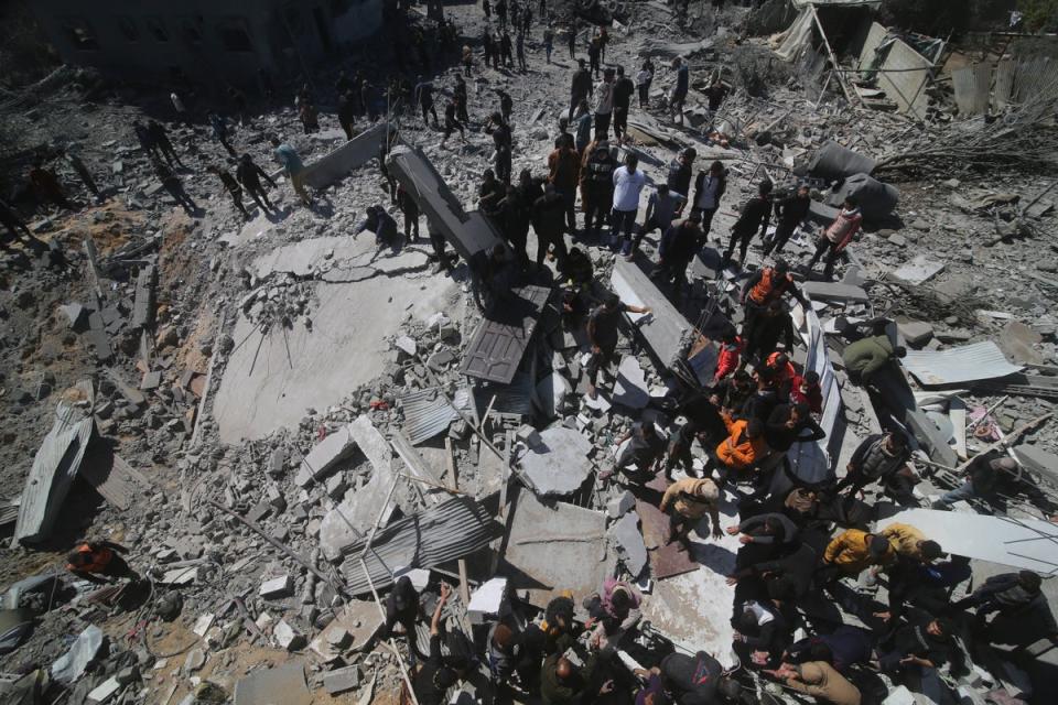 A destroyed residential building in Rafah (AP)