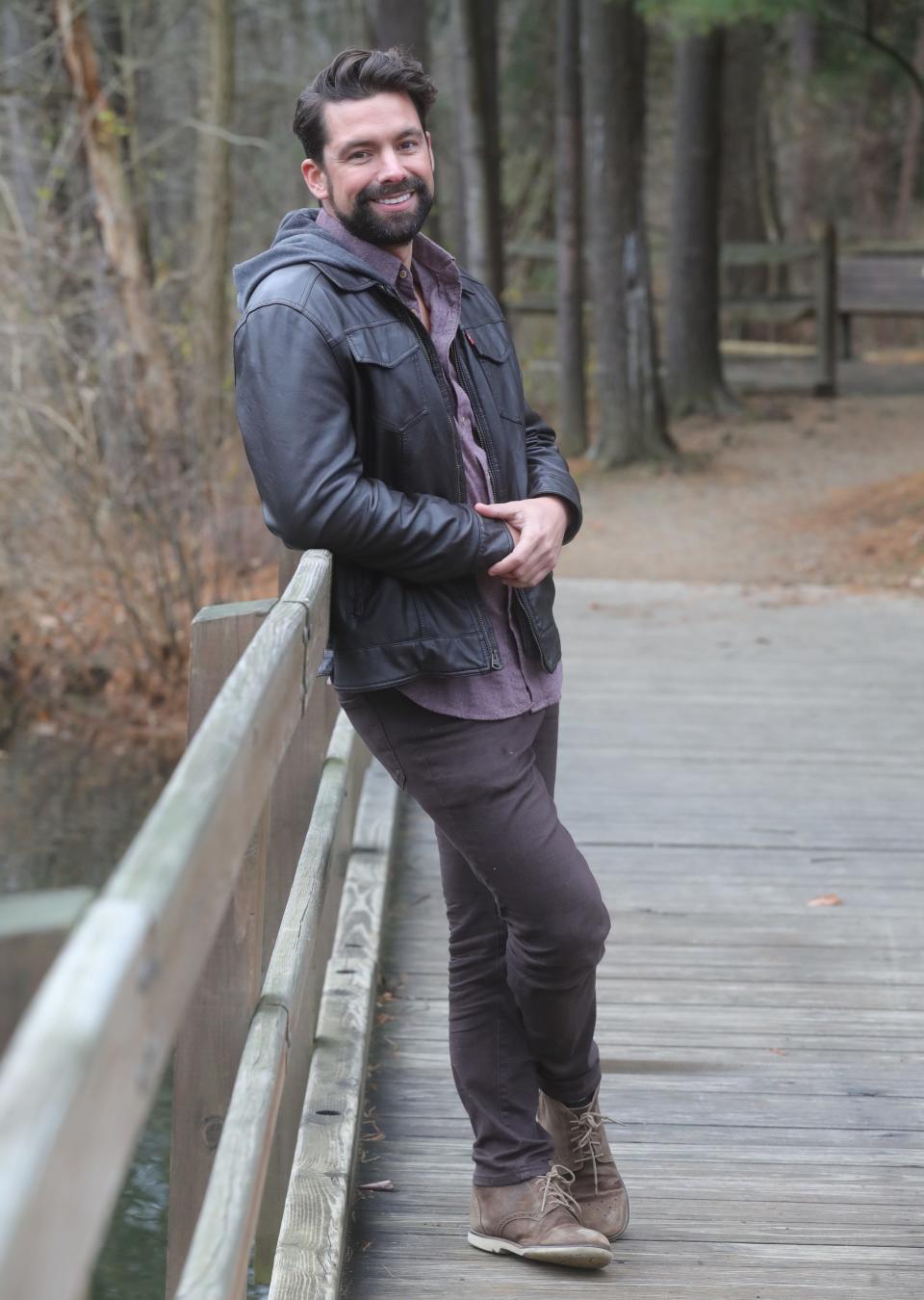Local "Bachelor in Paradise" star Michael Allio poses at the F.A. Seiberling Nature Realm. Because the series is filmed on a beach, nature and its critters were just as much a part of contestants’ lives as the cameras.