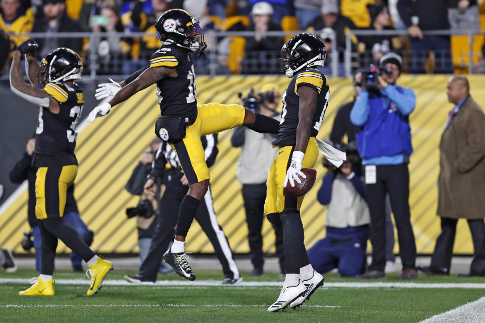 Pittsburgh Steelers wide receiver James Washington, right, celebrates his touchdown catch with Diontae Johnson (18) during the first half of the team's NFL football game against the Los Angeles Rams in Pittsburgh, Sunday, Nov. 10, 2019. (AP Photo/Keith Srakocic)