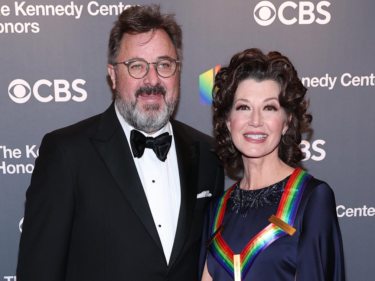 Amy Grant (R) and Vince Gill attend the 45th Kennedy Center Honors ceremony at The Kennedy Center on December 04, 2022 in Washington, DC