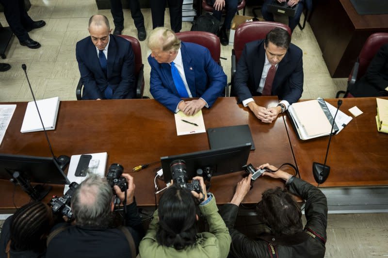 Former President Donald Trump sits in the courtroom during his criminal trial at Manhattan criminal court in New York on Friday. Trump's trial is wrapping up the third week on charges he allegedly falsified business records to cover up a sex scandal during the 2016 presidential campaign. Pool Photo by Doug Mills//UPI