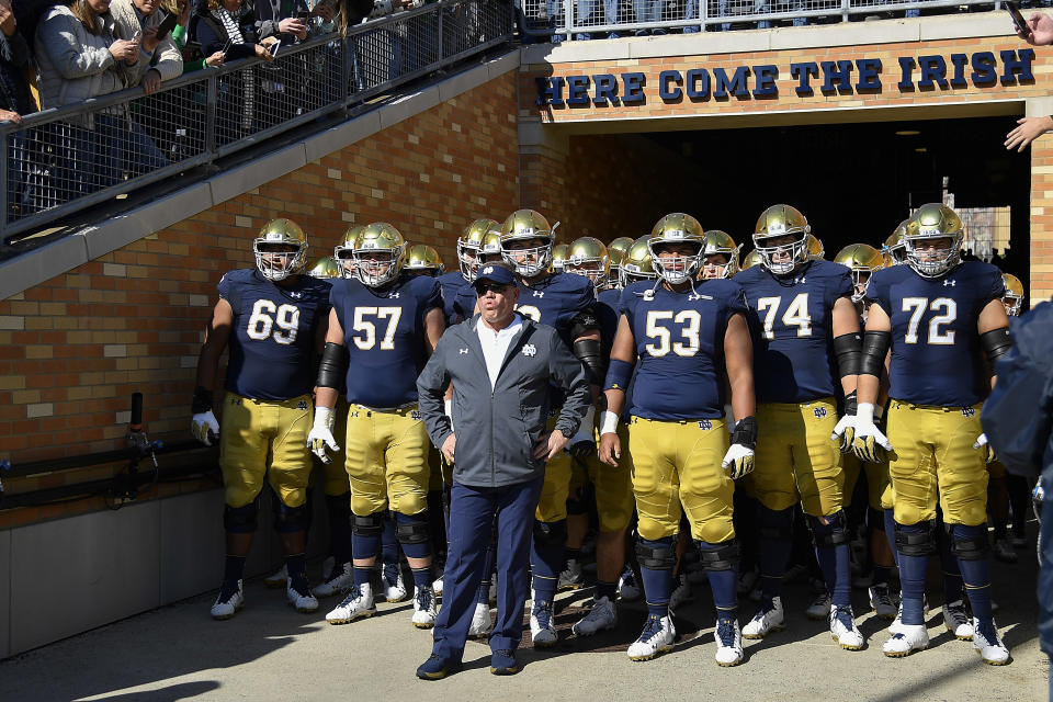 Head coach Brian Kelly stands in the tunnel in front of his team before Notre Dame’s game against Pittsburgh on Oct. 13, 2018, in South Bend, Indiana. (Getty)
