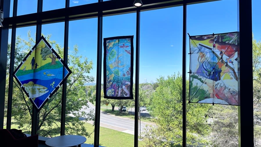 Kites places on windows act like stained glass. (Credit: Eric Henrikson/KXAN)