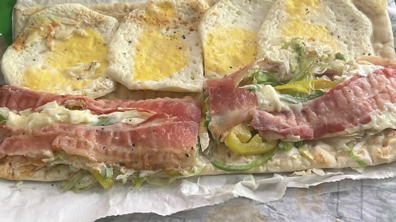 Subway grinder with bacon, egg, and peppers