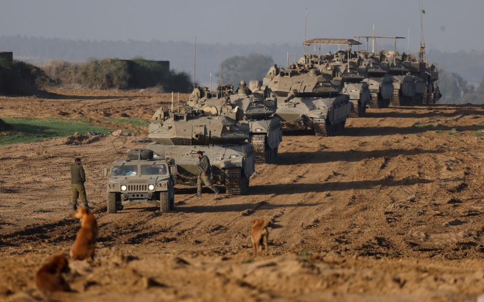 A convoy of Israeli military tanks and Armoured Personnel Carriers (APC) enter Israel, as they leave from Gaza