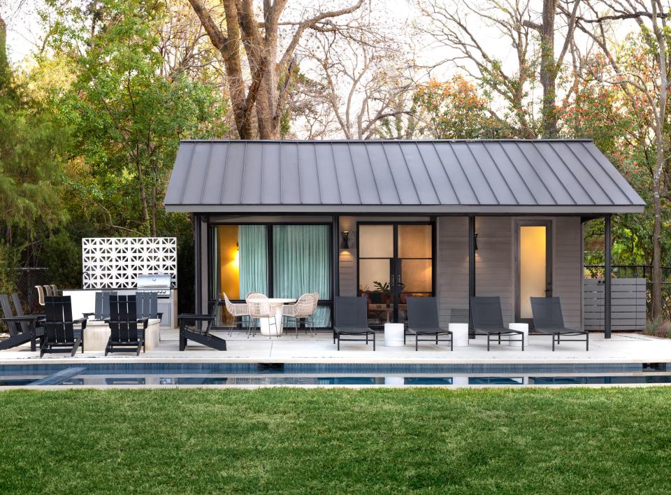 Pool house with outdoor seating area