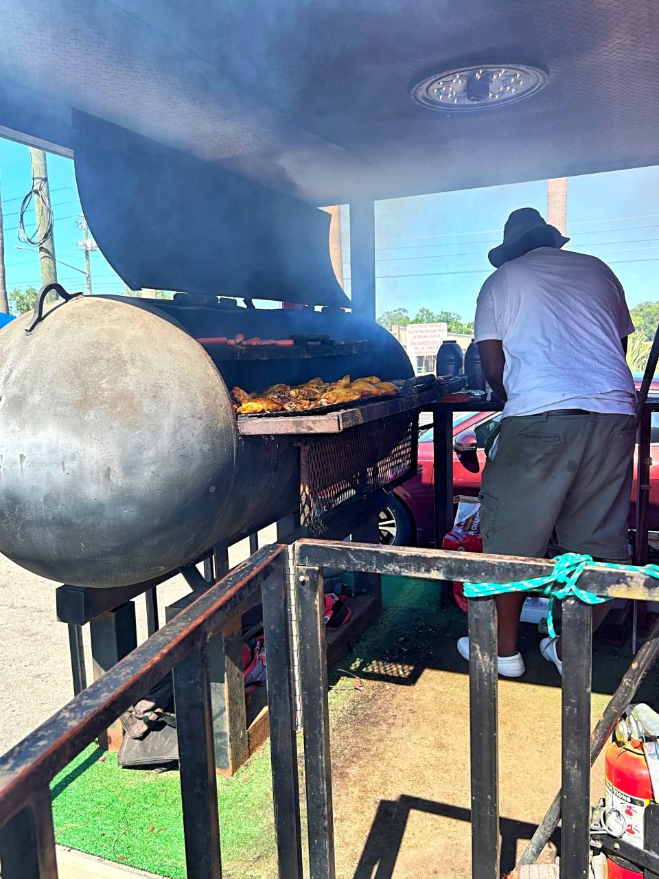 Southside Tallahassee residents being served hotdogs, hamburgers and more following Friday's storms on Saturday, May 11.