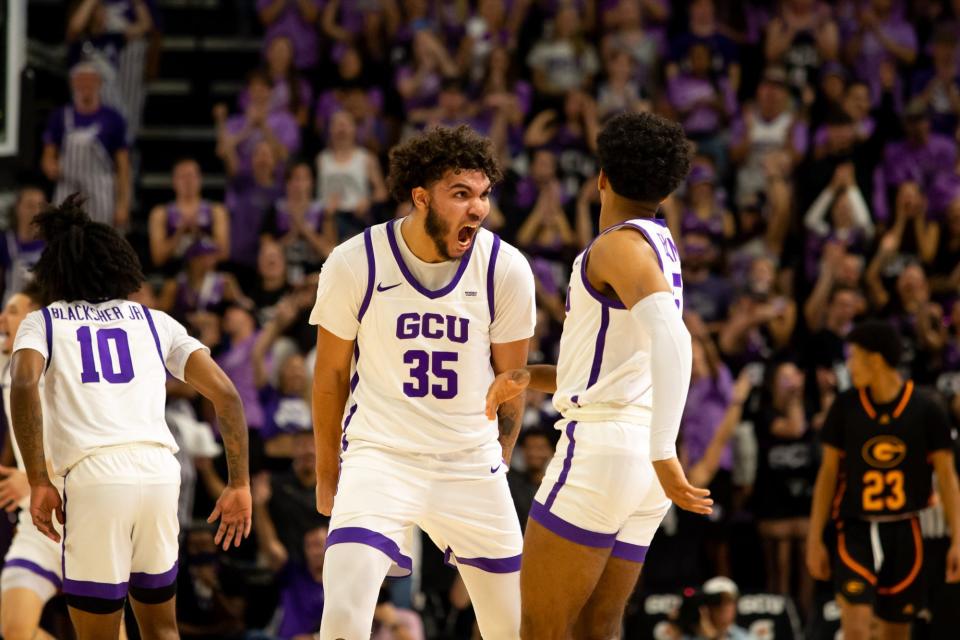 11/9/2021, Phoenix, Arizona, GCU versus Grambling Basketball, Taeshon Cherry (#35) gets fired up about Jalen Blackmon's (#5) three pointer.