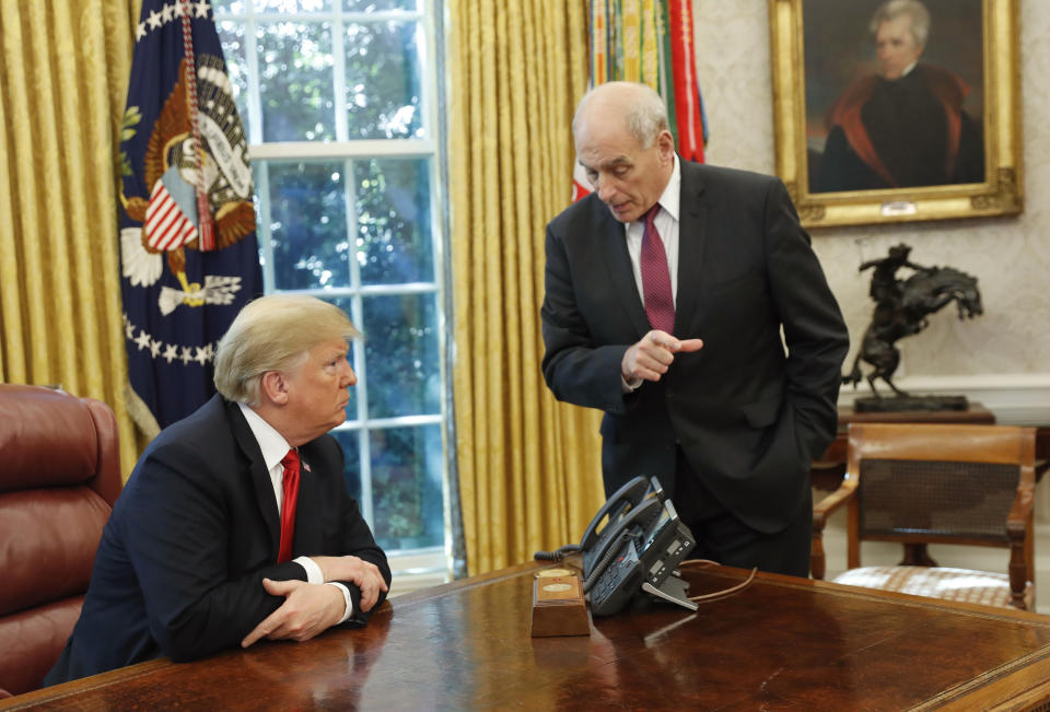 Kelly speaks with President Trump after a meeting to discuss potential damage from Hurricane Michael, in the Oval Office on Oct. 10, 2018. (Photo: Pablo Martinez Monsivais/AP)