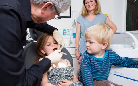 Children may be turning away from professional dentists, such as the one pictured - Credit: Andrew Crowley