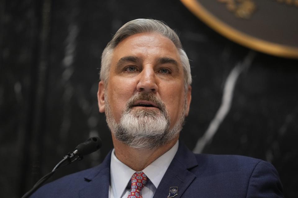 Indiana Gov. Eric Holcomb delivers his State of the State address to a joint session of the legislature at the Statehouse, Tuesday, Jan. 10, 2023, in Indianapolis. (AP Photo/Darron Cummings)