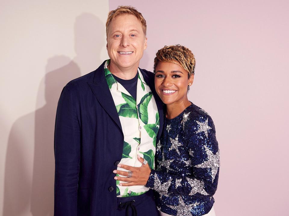 Alan Tudyk and Ariana Debose pose at the IMDb Official Portrait Studio during D23 2022 at Anaheim Convention Center on September 09, 2022 in Anaheim, California