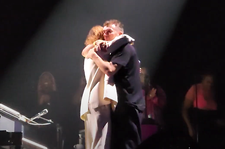 Gorillaz frontman Damon Albarn embraces Beck after Beck's surprise appearance at Gorillaz's concert at Los Angeles's Forum on Sept. 23, 2022. (Photo: YouTube)