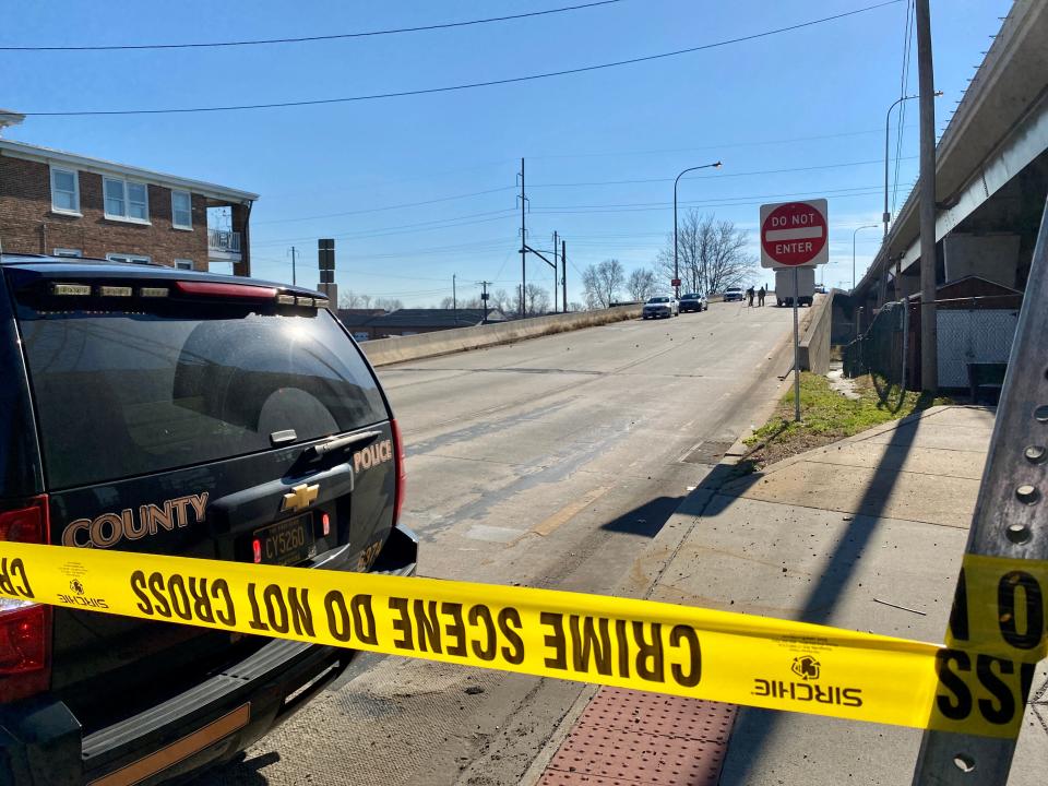 Police tape blocks off the Route 141 off-ramp into Newport, where a carjacking occurred Friday morning that led to a police shooting.