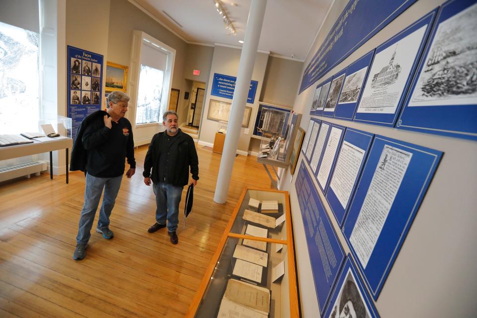 Marcus Rediker, professor of Atlantic hstory at the University of Pittsburgh, and author and co-curator, Timothy Walker, of UMass Dartmouth, take a look at the newly installed "Sailing to Freedom: Maritime Dimensions of the Underground Railroad" exhibit.