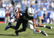 Daryl Collins #23 of the Kentucky Wildcats runs with the ball during the SEC game against the Mississippi State Bulldogs at Commonwealth Stadium on October 6, 2012 in Lexington, Kentucky. (Photo by Andy Lyons/Getty Images)