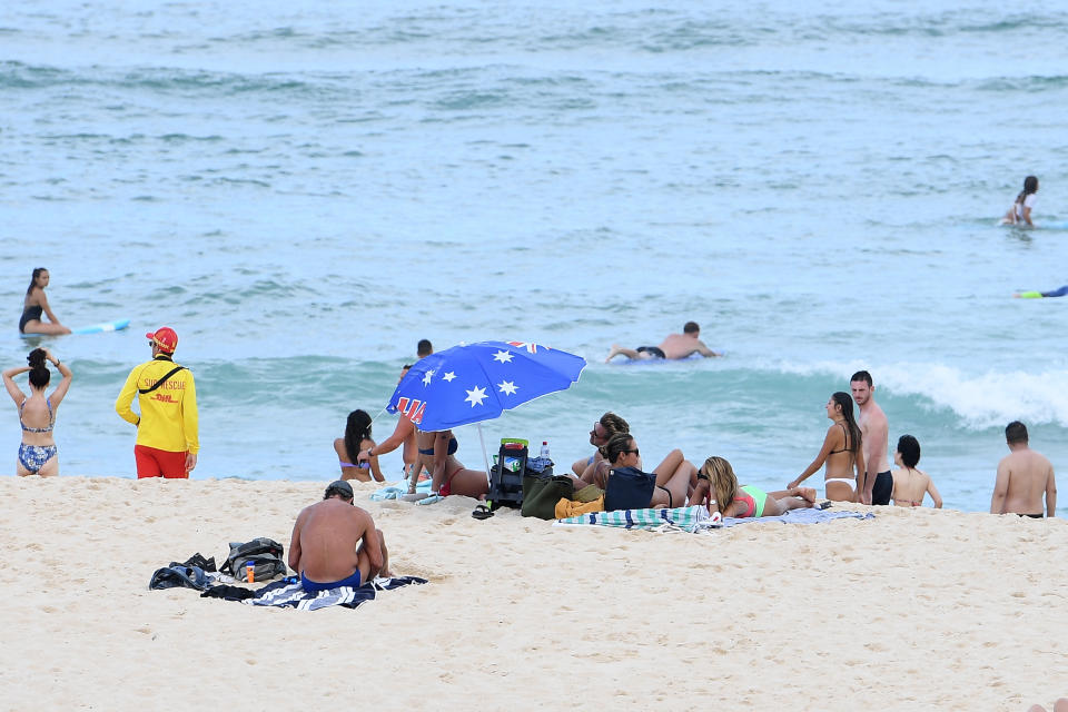 Beachgoers escape the heat at Bondi Beach in Sydney. Source: AAP