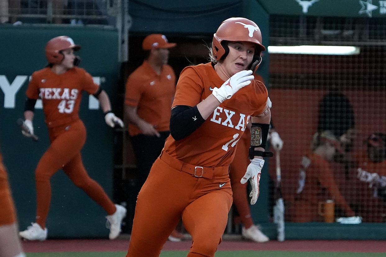 Texas' Reese Atwood runs to first base during Friday's series-opening loss to Oklahoma at McCombs Field. But Atwood made a big play at the plate as catcher on Saturday as Texas handed Oklahoma a 2-1 loss, snapping the top-ranked Sooners' 40-game conference winning streak.