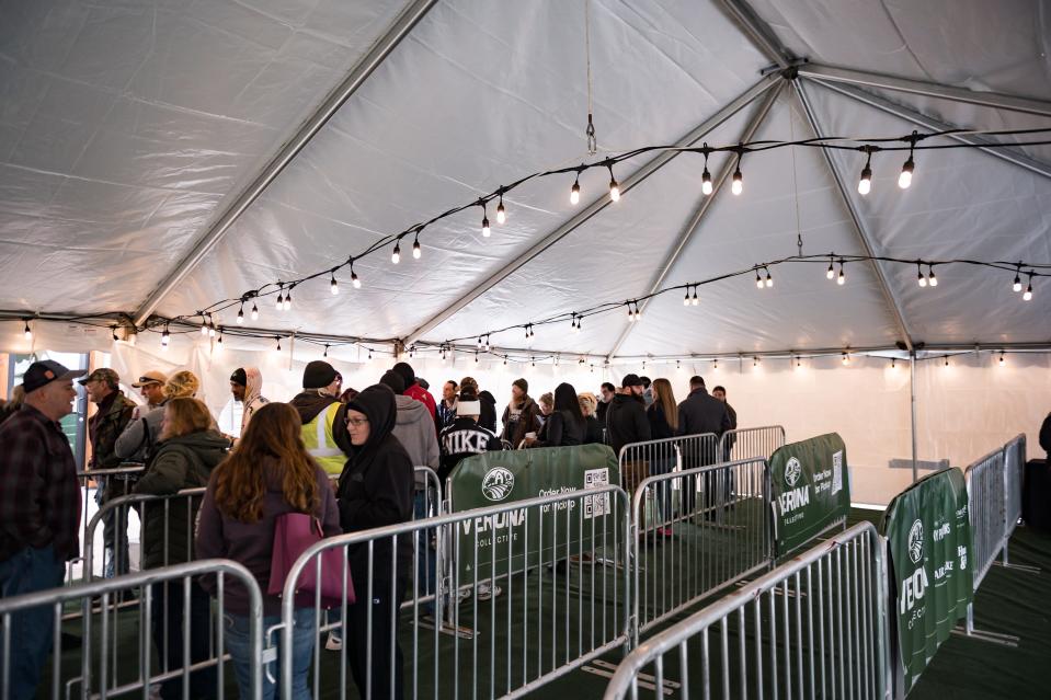 Customers queue in line for the grand opening of the Verona Collective dispensary, located at 5250 Willow Place in Verona, New York directly across from Turning Stone Resort Casino on Wednesday, January 3, 2024.