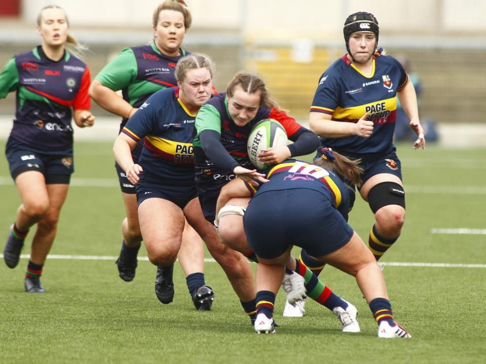 Impartial Reporter: Valley's Katie Hetherington gets stopped by Banbridge's Jemma Farrell.