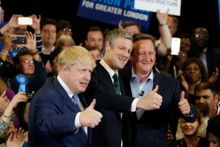 Conservative Party London mayoral candidate Zac Goldsmith (C), London Mayor Boris Johnson (L) and Prime Minister David Cameron pose at a mayoral campaign event on May 3, 2016