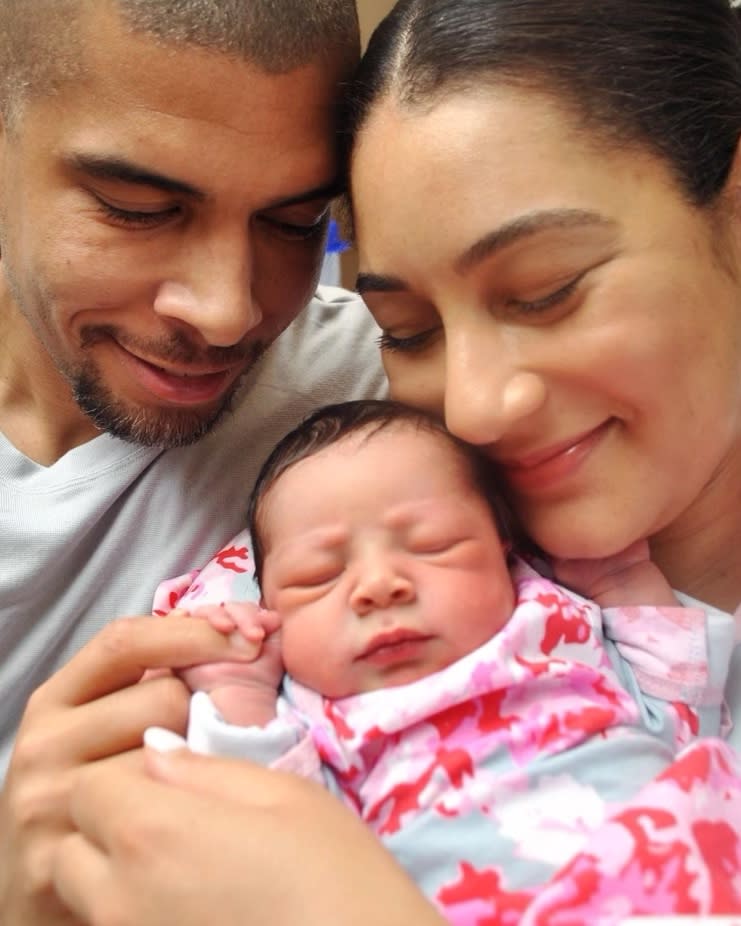 Morgan Radford and David Williams with their daughter. (Andrea Del Valle / Courtesy Mom365 Newborn Photography)