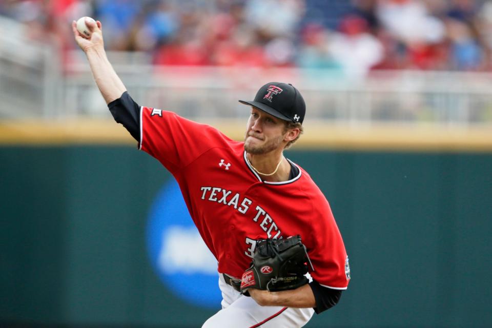 Texas Tech starting pitcher Caleb Kilian (32), now a top Chicago prospect, delivers against Arkansas in the first inning in 2019.