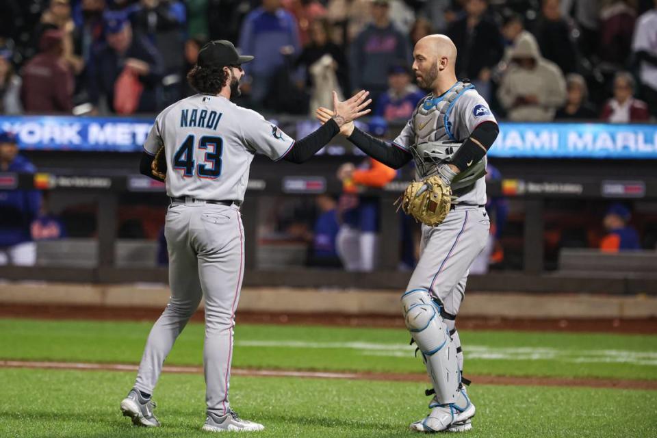 Sep 27, 2023; New York, NY, USA; Miami Marlins relief pitcher Andrew Nardi (43) celebrates with catcher Jacob Stallings (58) after defeating the New York Mets at Citi Field.