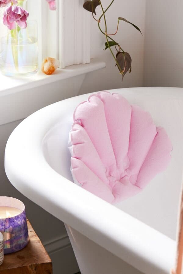 For the friend who follows a night bath routine, this seashell neck pillow's perfect for them to get some much-needed rest and relaxation. It has a suction cup in the back to stick to a bathtub. <a href="https://fave.co/2qrkl8G" target="_blank" rel="noopener noreferrer"><strong>Get it for $16 at Urban Outfitters</strong></a>. 