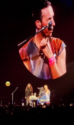 <p>Selena Gomez Instagram</p> Chris Martin looked delighted as Selena Gomez walked out on stage