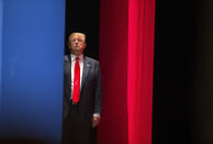 <p>Trump prepares to go onstage to during the Freedom Summit in Greenville, S.C., on May 9, 2015. <i>(Photo: Chris Keane/AP)</i> </p>