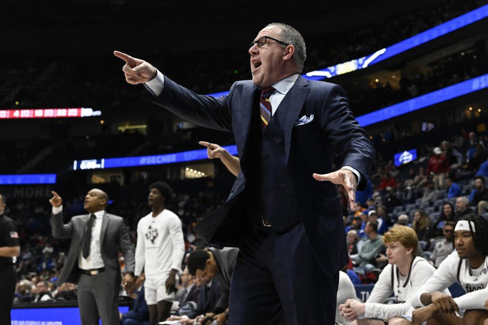 Texas A&M Buzz Williams shouts to players during the first half of an NCAA college basketball game against Arkansas in the quarterfinals of the Southeastern Conference Tournament, Friday, March 10, 2023, in Nashville, Tenn. (AP Photo/John Amis)