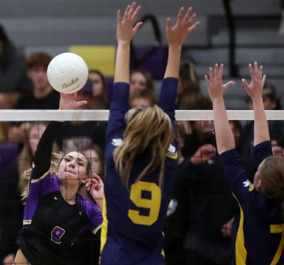 North Kitsap's Iliana Brockett (8) hits a shot past Bainrbidge's Holly McFadden (9) and Emma Adcock (7) during their game in Poulsbo on Tuesday, Sept. 13, 2022.